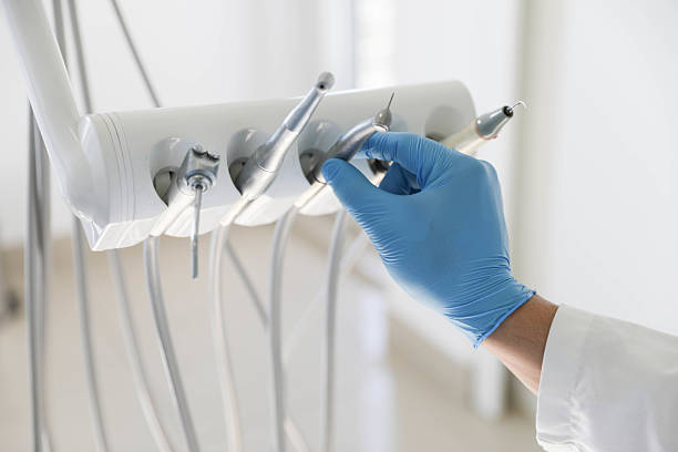 Professional Invisalign Clear Aligners technician working in Three Rivers, MI